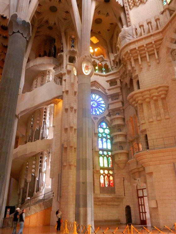 Spiral staircase and stained glass windows combine for dramatic effect