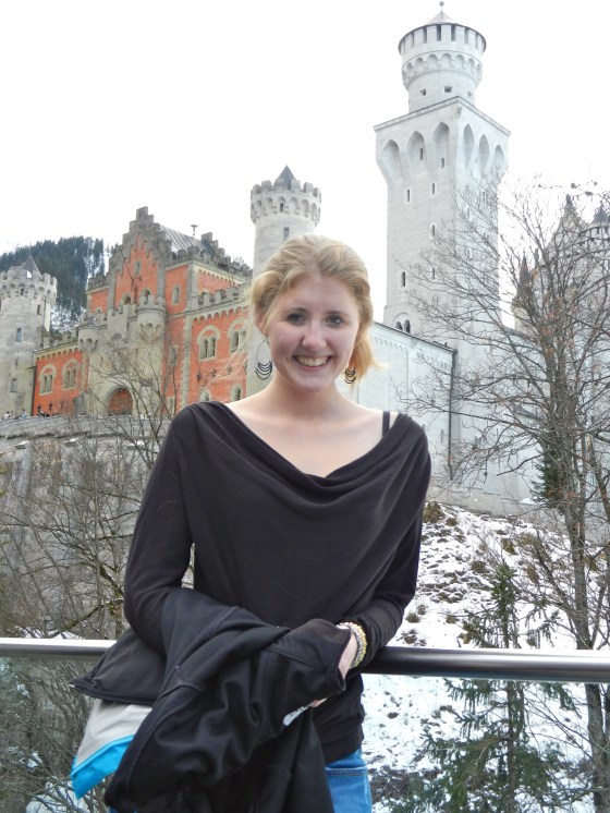 Lindsey poses in front of her fairy tale castle