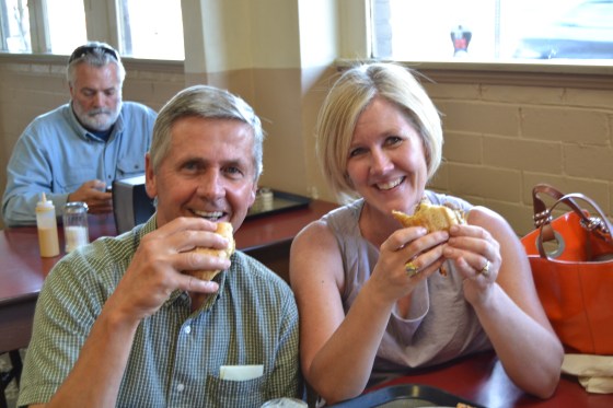Dad and I stop just long enough for a picture of us eating our sandwiches