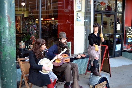Enjoying folk music on the streets of Asheville, NC