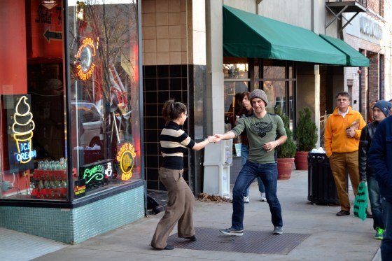 This couple couldn't resist a little swing dancing on the street