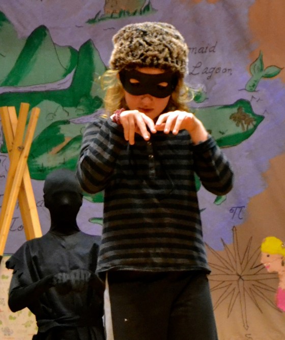 Lilly in Lost Boy mode with Peter Pan's shadow just behind her