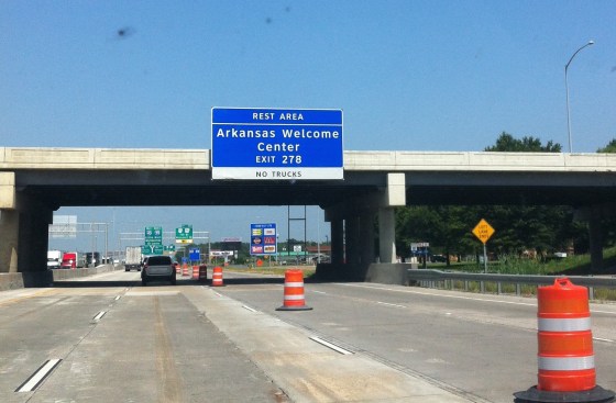 Driving and taking photos is probably not a good idea. 